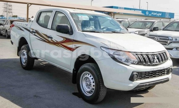 Buy Import Mitsubishi L200 White Car in Import - Dubai in Togo Buy Import Mitsubishi L200 White Car in Import - Dubai in Togo