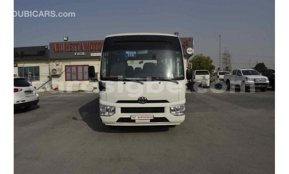 Acheter Import Voiture Toyota Coaster Blanc à Import - Dubai, Togo Acheter Import Voiture Toyota Coaster Blanc à Import - Dubai, Togo