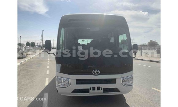 Acheter Import Voiture Toyota Coaster Blanc à Import - Dubai, Togo Acheter Import Voiture Toyota Coaster Blanc à Import - Dubai, Togo