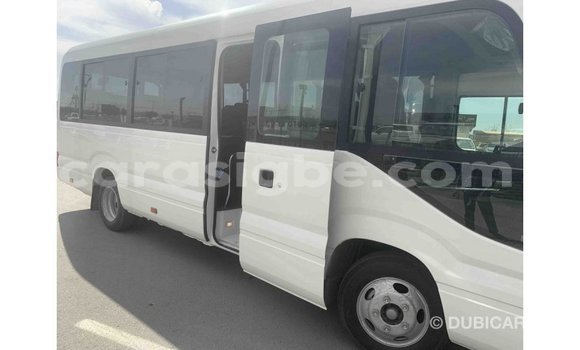 Acheter Import Voiture Toyota Coaster Blanc à Import - Dubai, Togo Acheter Import Voiture Toyota Coaster Blanc à Import - Dubai, Togo