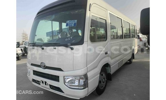 Acheter Import Voiture Toyota Coaster Blanc à Import - Dubai, Togo Acheter Import Voiture Toyota Coaster Blanc à Import - Dubai, Togo
