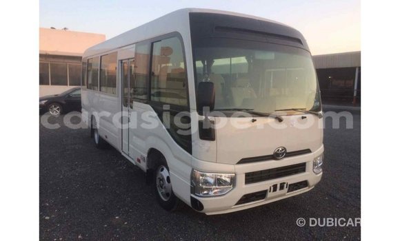 Acheter Import Voiture Toyota Coaster Blanc à Import - Dubai, Togo Acheter Import Voiture Toyota Coaster Blanc à Import - Dubai, Togo