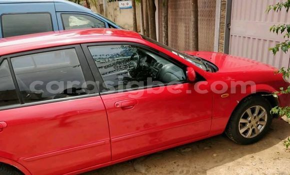 Buy Used Mazda 323 Red Car in Lome in Togo Buy Used Mazda 323 Red Car in Lome in Togo