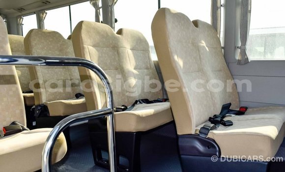 Acheter Import Voiture Toyota Coaster Blanc à Import - Dubai, Togo Acheter Import Voiture Toyota Coaster Blanc à Import - Dubai, Togo