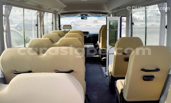 Acheter Import Voiture Toyota Coaster Blanc à Import - Dubai, Togo Acheter Import Voiture Toyota Coaster Blanc à Import - Dubai, Togo