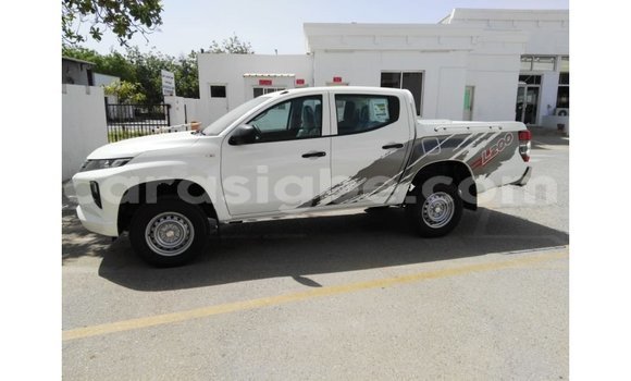 Buy Import Mitsubishi L200 White Car in Import - Dubai in Togo Buy Import Mitsubishi L200 White Car in Import - Dubai in Togo