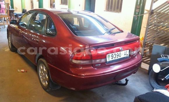 Acheter Occasion Voiture Mazda 323 Rouge à Adawlato, Togo Acheter Occasion Voiture Mazda 323 Rouge à Adawlato, Togo