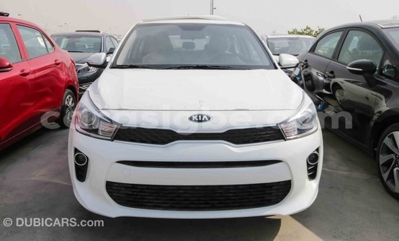 Acheter Import Voiture Kia Rio Blanc à Import - Dubai, Togo Acheter Import Voiture Kia Rio Blanc à Import - Dubai, Togo