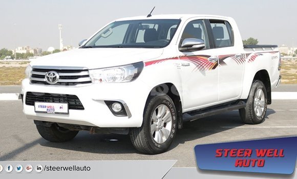 Buy Import Toyota Hilux White Car in Import - Dubai in Togo