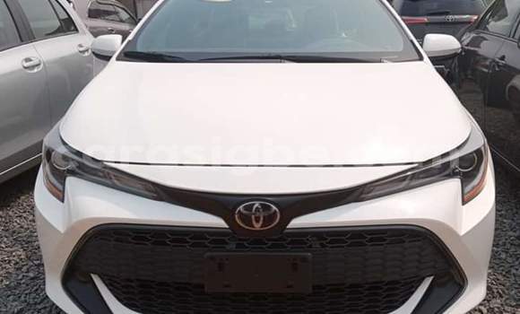 Buy Import Toyota Corolla White Car in Lome in Togo Buy Import Toyota Corolla White Car in Lome in Togo