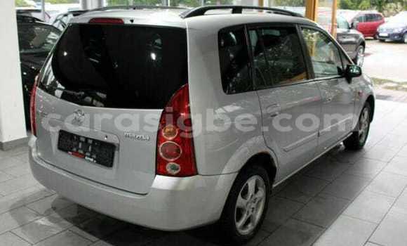 Acheter Import Voiture Mazda Mazda Premacy Beige à Lomé, Togo Acheter Import Voiture Mazda Mazda Premacy Beige à Lomé, Togo