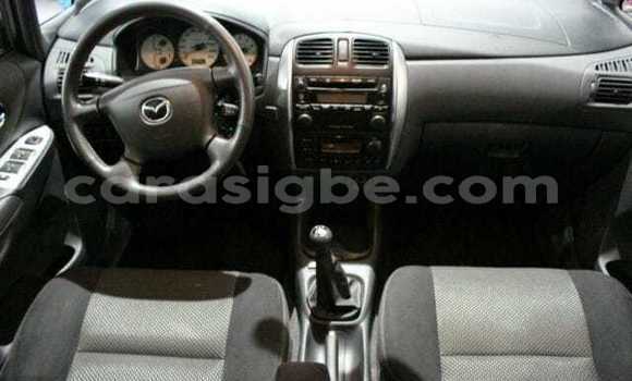 Acheter Import Voiture Mazda Mazda Premacy Beige à Lomé, Togo Acheter Import Voiture Mazda Mazda Premacy Beige à Lomé, Togo