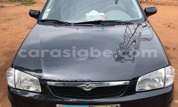 Buy Used Mazda 323 Black Car in Adawlato in Togo Buy Used Mazda 323 Black Car in Adawlato in Togo