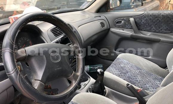 Buy Used Mazda 323 Black Car in Adawlato in Togo Buy Used Mazda 323 Black Car in Adawlato in Togo
