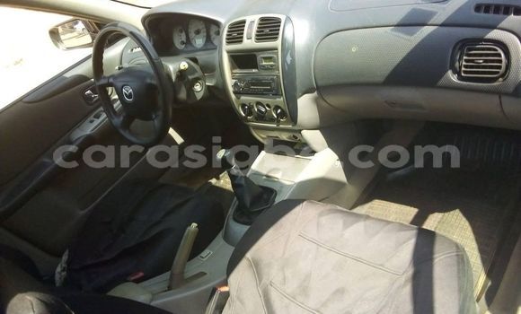 Buy Used Mazda 323 Blue Car in Adawlato in Togo Buy Used Mazda 323 Blue Car in Adawlato in Togo