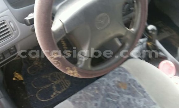 Buy Used Mazda 323 Red Car in Lome in Togo Buy Used Mazda 323 Red Car in Lome in Togo