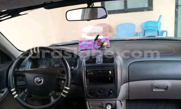 Buy Used Mazda 323 Red Car in Lome in Togo Buy Used Mazda 323 Red Car in Lome in Togo