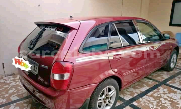 Buy Used Mazda 323 Red Car in Lome in Togo Buy Used Mazda 323 Red Car in Lome in Togo