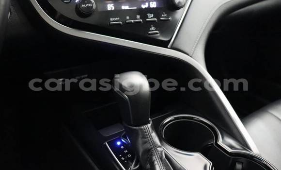 Acheter Import Voiture Toyota Camry Blanc à Kpessi, Plateaux Acheter Import Voiture Toyota Camry Blanc à Kpessi, Plateaux