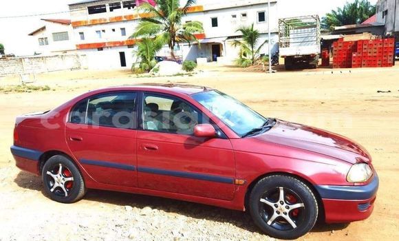 Acheter Occasion Voiture Toyota Avensis Rouge à Lomé, Togo Acheter Occasion Voiture Toyota Avensis Rouge à Lomé, Togo