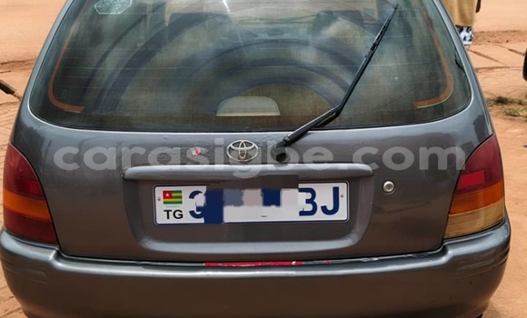 Acheter Occasion Voiture Toyota Starlet Gris à Lome, West africa Acheter Occasion Voiture Toyota Starlet Gris à Lome, West africa