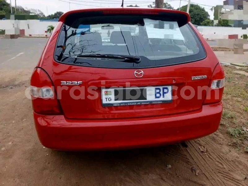 Big with watermark mazda 323 togo forever 10654