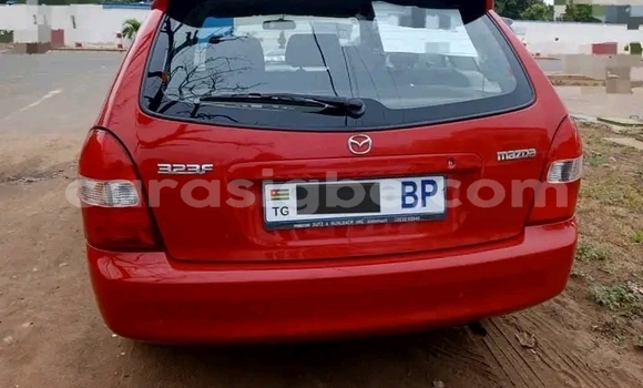 Buy Used Mazda 323 Red Car in Forever in Togo Buy Used Mazda 323 Red Car in Forever in Togo