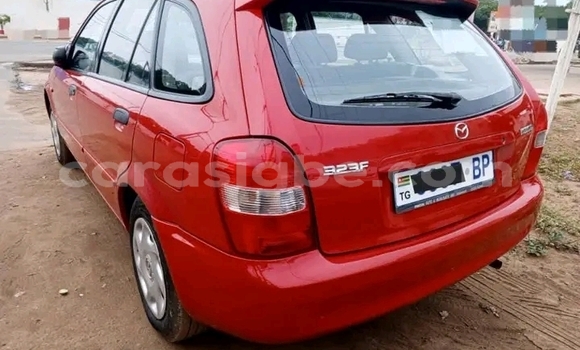 Buy Used Mazda 323 Red Car in Forever in Togo Buy Used Mazda 323 Red Car in Forever in Togo