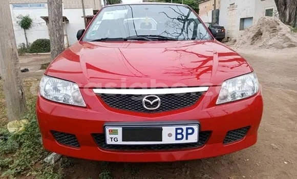 Buy Used Mazda 323 Red Car in Forever in Togo Buy Used Mazda 323 Red Car in Forever in Togo