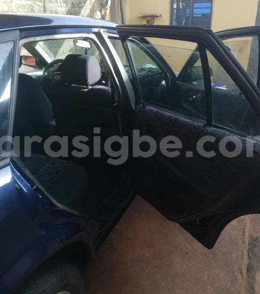 Big with watermark mazda 323 west africa lome 11307