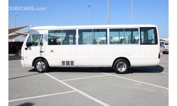 Buy Import Toyota Coaster White Car in Import - Dubai in Togo