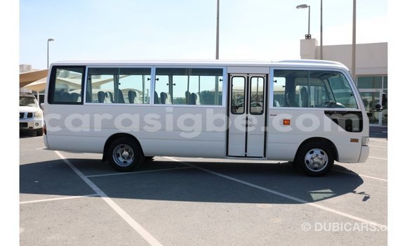 Buy Import Toyota Coaster White Car in Import - Dubai in Togo