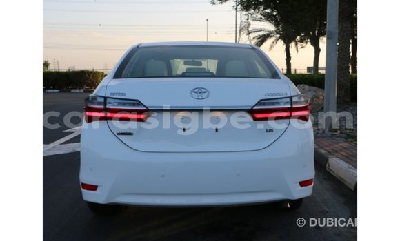 Acheter Import Voiture Toyota Corolla Blanc à Import - Dubai, Togo Acheter Import Voiture Toyota Corolla Blanc à Import - Dubai, Togo